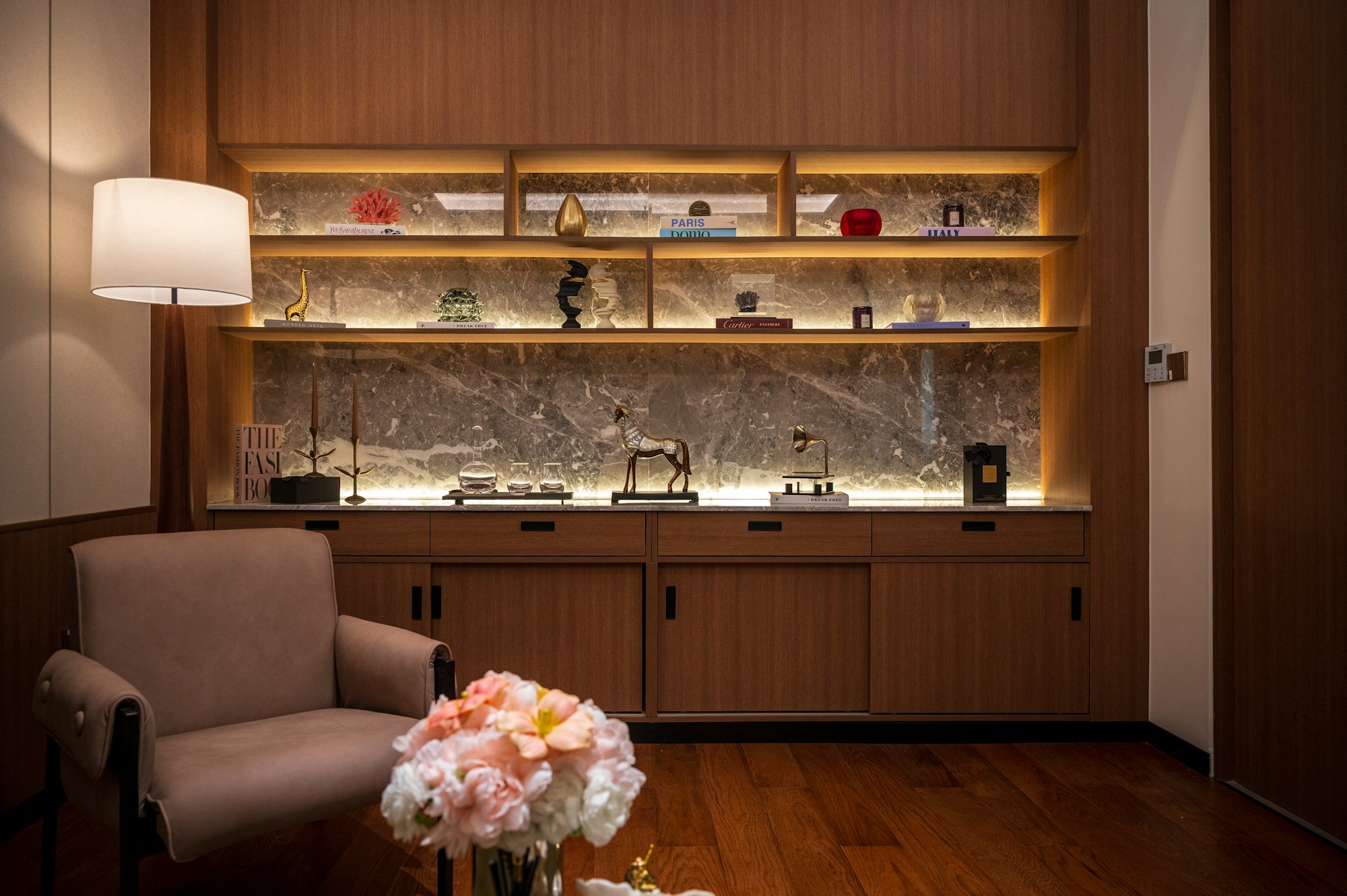 Northvale’s private consultation lounge with warm wood shelving